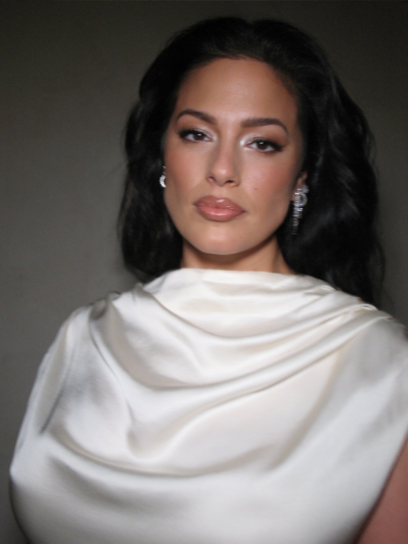 Ashley Graham at the CFDA Fashion Awards, soft dark waves framing her face