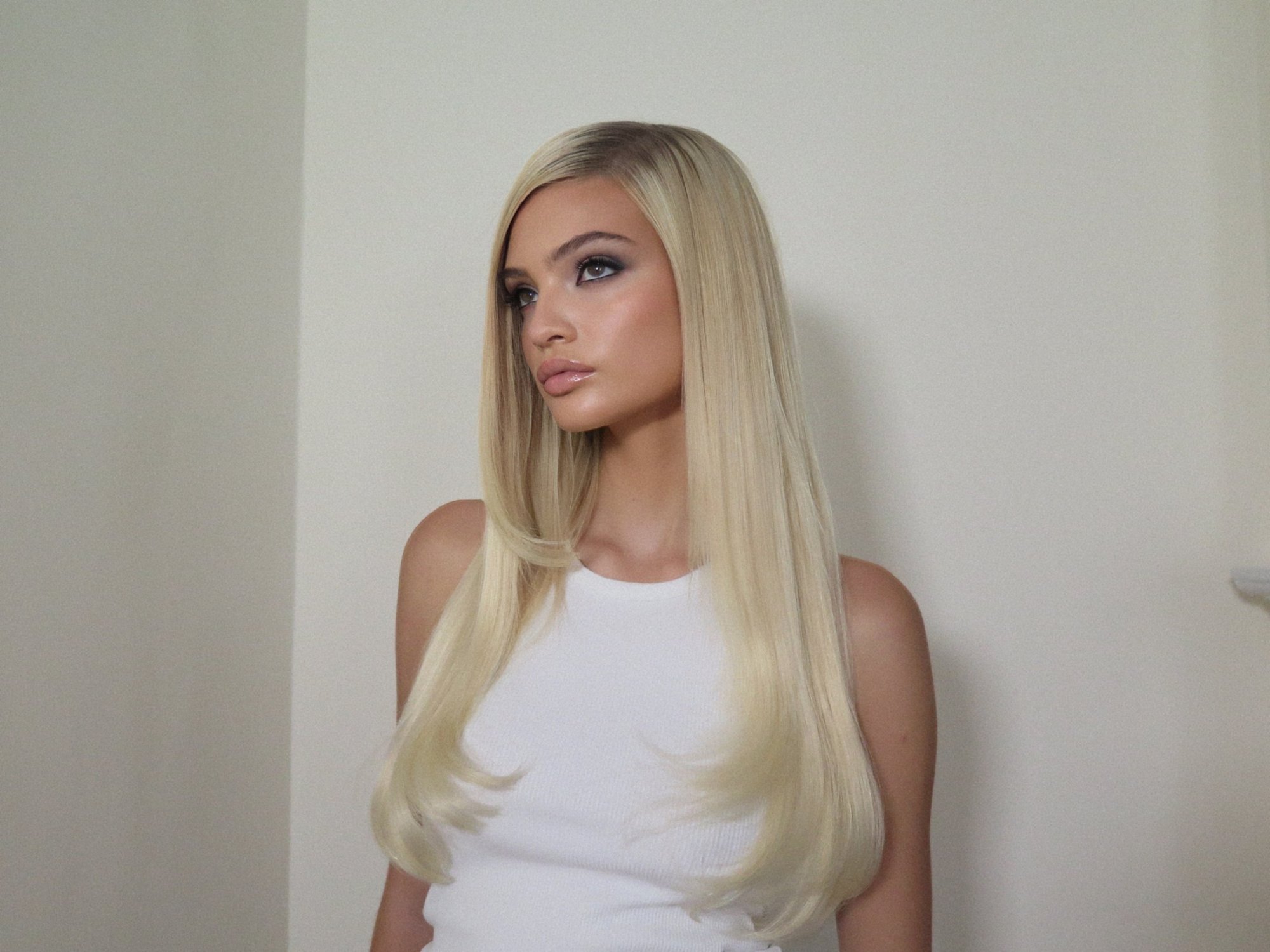 Elle Quist with sleek, icy blonde lengths